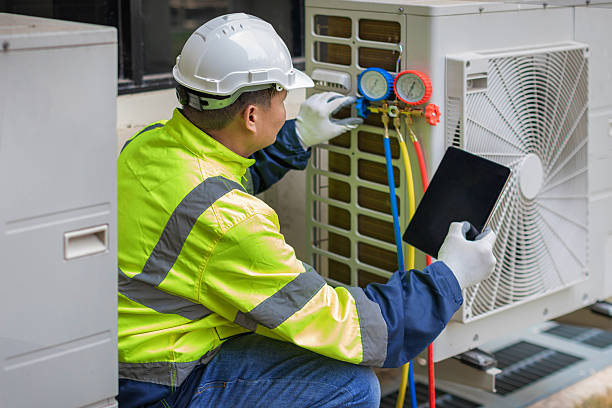 Professional Heat Pump Repair technician working in Linden, TN